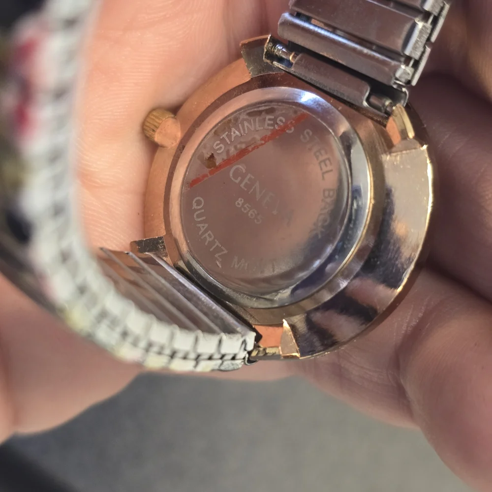 Geneva Black Dial Women's Watch with Floral Stretch Band